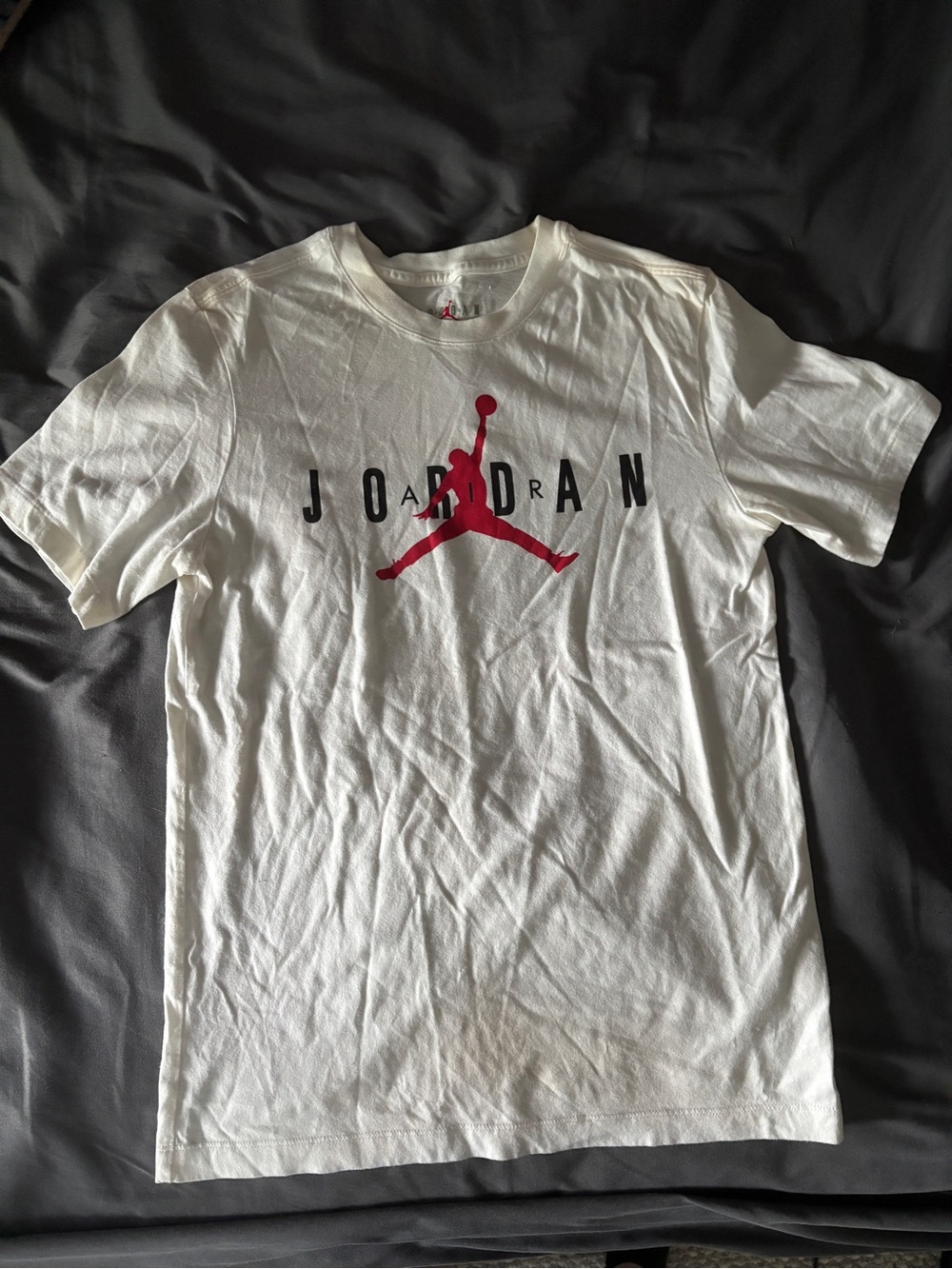 Jordan White Short Sleeve Tee with Red Jumpman and Black Lettering
